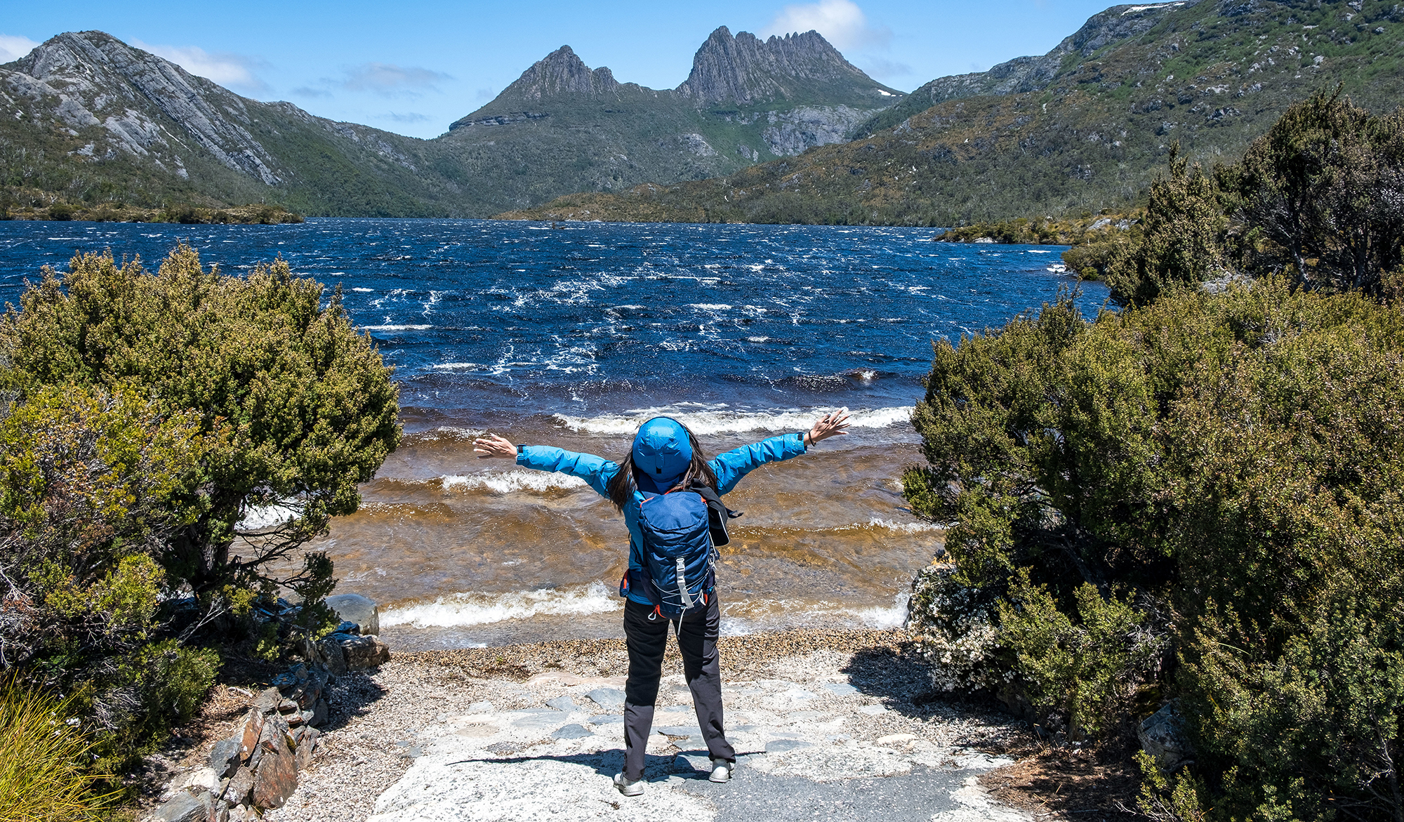 Female hiker enjoy the natural beauty of Mount Cradle and Dove Lake at Tasmania